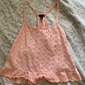 Pink thin strapped crop top.